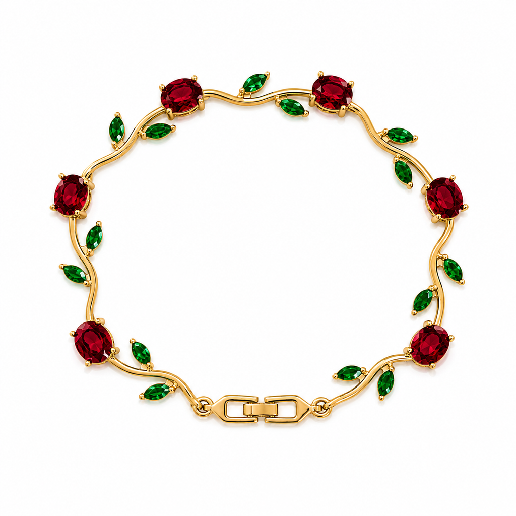 A gold-plated vine bracelet featuring oval-cut red gemstones and small marquise-cut green gemstones, displayed on a clean white background.