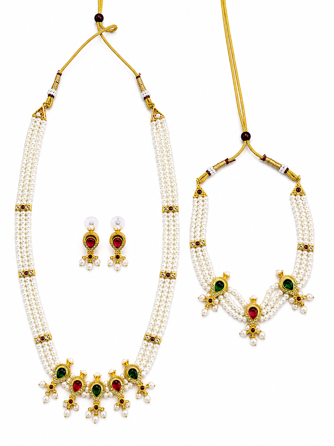 A traditional Indian jewelry set featuring a multi-strand pearl necklace, a matching pearl necklace with a decorative pendant, and a pair of matching earrings. The jewelry is made of white pearls and gold-plated metal with green and red stone accents.